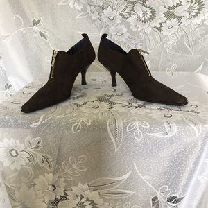 Imported Italian , dressy suede ankle pumps.